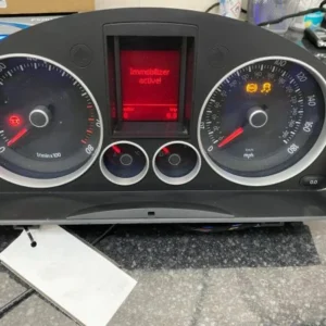Golf MK5 GTI Highline instrument cluster on a bench displaying Immobilizer active