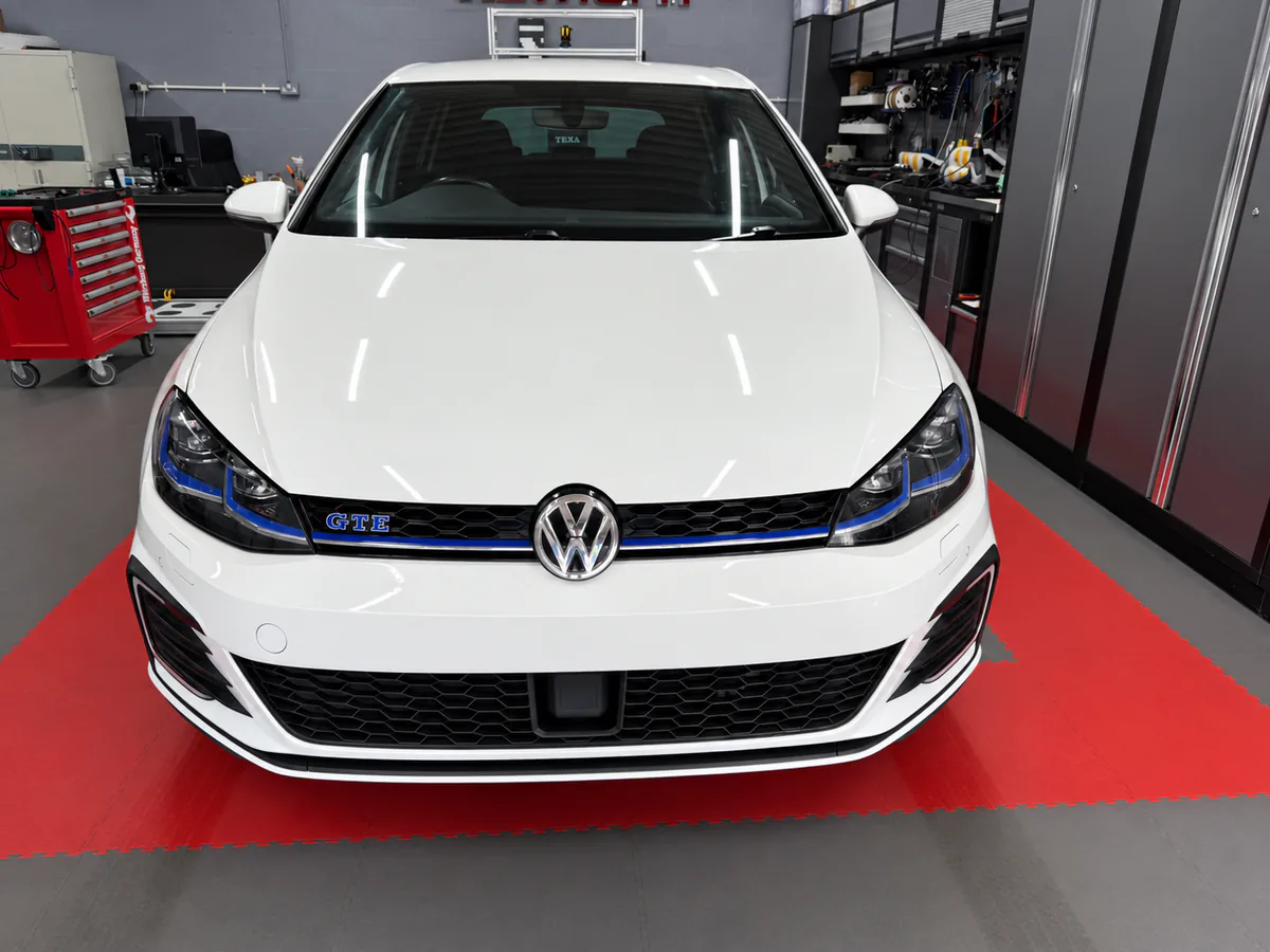 White Golf MK7 GTE with Highline reverse camera retrofit