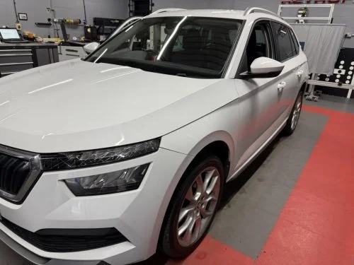 White Škoda Kamiq at the VW Retrofit workshop
