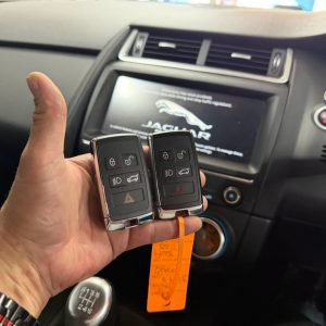 Genuine Jaguar smart key supplied and programmed
