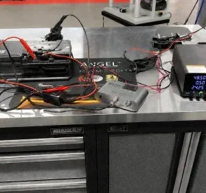Audi 48V starter generator connected to bench-testing equipment