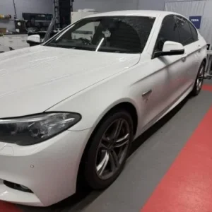 White BMW F-Series at the VW Retrofit workshop in Redditch