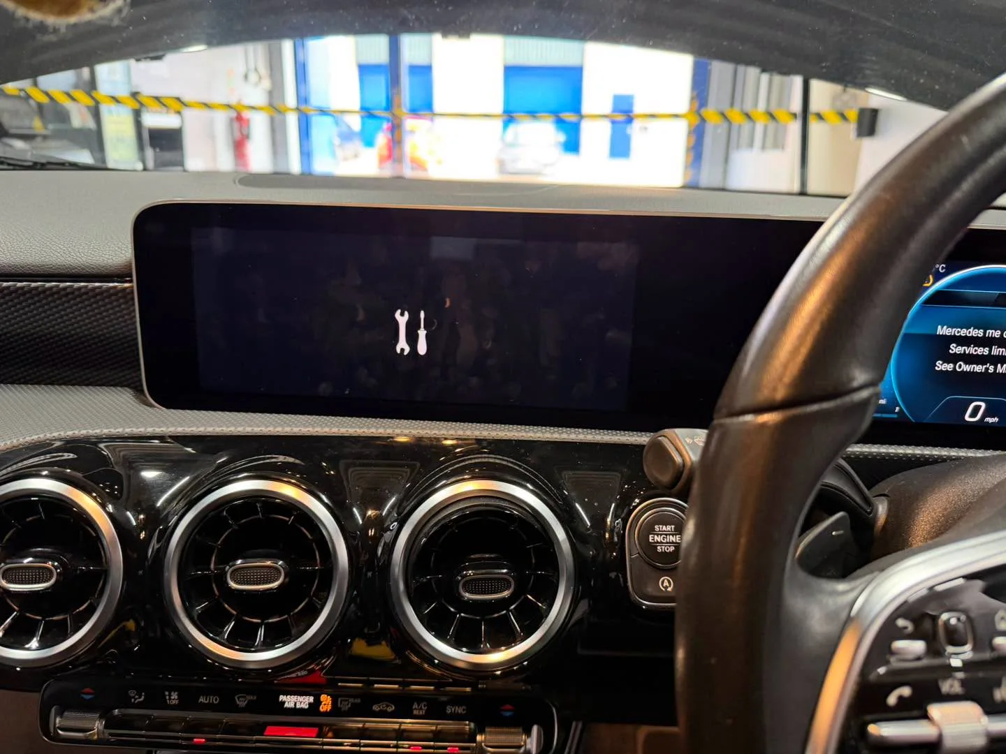 Mercedes-Benz dashboard displaying a service warning during diagnostics