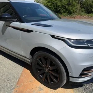 White Range Rover Velar parked outside