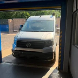 White VW Crafter at the VW Retrofit workshop in Redditch
