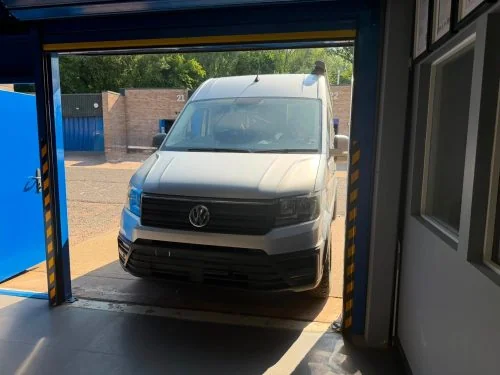 White VW Crafter at the VW Retrofit workshop in Redditch